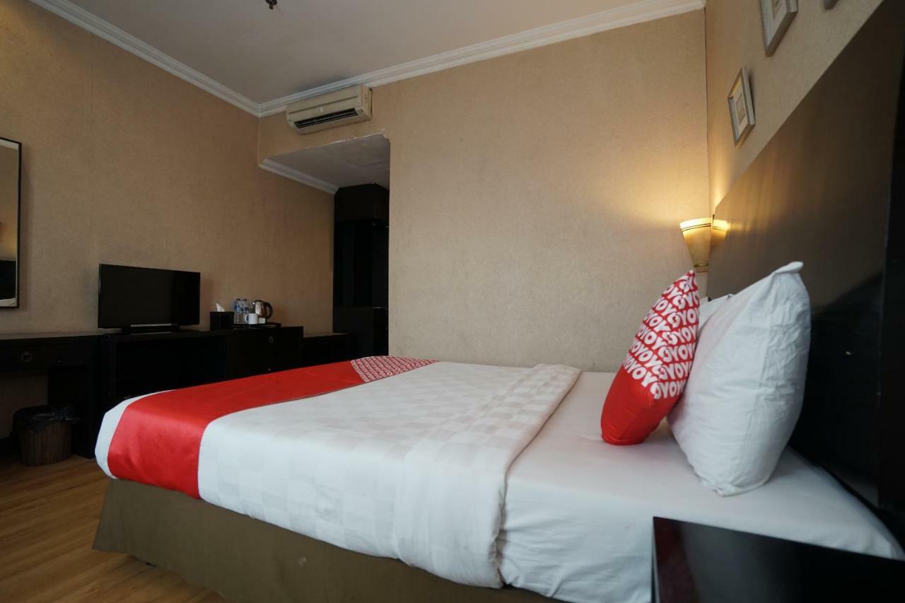 Capital O 1128 Hotel Imara Palembang Exterior foto