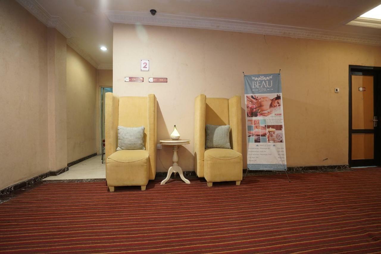 Capital O 1128 Hotel Imara Palembang Exterior foto